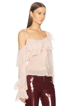 Find BLUMARINE Ruffle Blouse Top In Pink on Editorialist. Blumarine Ruffle Blouse Top in Pink 100% silk. Made in Italy. Dry clean only. Pull-on styling. Adjustable shoulder strap. Flounce ruffle styling. Chiffon fabric. BMAF-WS110. A422C310A. About the designer: Inverted Triangle Outfits, Pink Silk Blouse, Spaghetti Strap Blouses, Flounce Top, Asymmetrical Blouse, Georgette Blouse, Asymmetrical Tops, Long Puff Sleeves, Chiffon Blouse