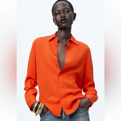 Nwt Zara Satin Shirt . Long Sleeve, Buttons Down In Vibrant Orange Color. Tag Is Still On. Trendy Orange Shirt For Work, Classic Orange Tops For Spring, Classic Orange Tops For Fall, Classic Orange Top For Fall, Chic Orange Collared Top, Chic Orange Tops For Workwear, Chic Orange Tops For Work, Elegant Orange Tops For Fall, Elegant Orange Top For Fall