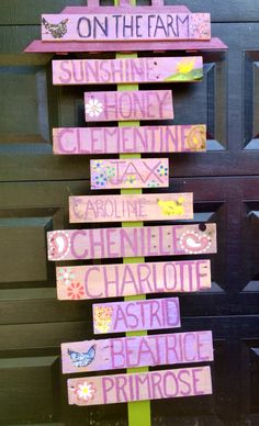 a wooden sign that says on the farm, sunshine and charlotte are prairie primos