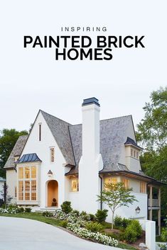 a white house with the words inspire painted brick homes