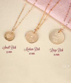 "This listing is for beautifully and dainty customizable disc necklace of your choice. Choose from 3 disk sizes and 3 metal choices. The engraving is completely customizable. This necklace looks great alone or layered! The charm can be engraved on one or both sides. ★ ★ TO ORDER: Please select from the first drop down menu your choice for engraving. The second drop down menu is for selecting your choice of metal, chain style, and necklace length. Add this item to your Etsy cart and when you proc Dainty Round Disc Jewelry For Mother's Day, Engraved Rose Gold Charm Necklaces For Wedding, Engraved Rose Gold Charm Necklace For Wedding, Rose Gold Engraved Charm Necklaces For Wedding, Customizable Rose Gold Dainty Charm Necklace, Delicate Personalized Round Disc Charm Necklaces, Personalized Rose Gold Round Disc Charm Necklaces, Delicate Personalized Round Disc Charm Necklace, Personalized Rose Gold Charm Necklaces For Wedding