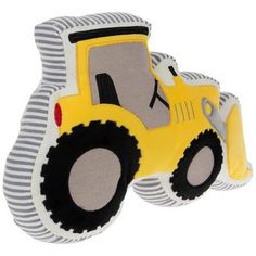 a yellow and black construction vehicle shaped pillow on a white background with grey stripes around it