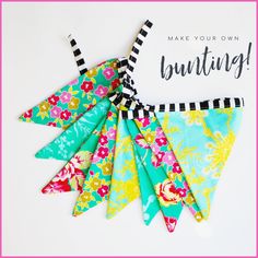 an upcycled bandana with the words make your own bunting on it