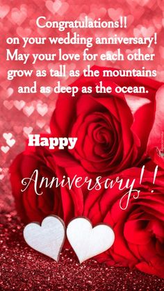 two red roses with hearts on them and the words happy anniversary written in white lettering