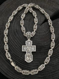 "Silver Orthodox set. Total weight 193 grams! 1️⃣ Silver chain \"Save and Preserve\" with the image of the Mother of God ✔️Weight 150 grams ✔️Size 65 cm/ 25,6 inches ✔️Width 9/8 mm ✔️The chain shows: 🔘 Mother of God 🔘Cherub and \"Save and Preserve\" 2️⃣Silver Orthodox cross Art. 0159 ✔️925 silver with blackening ✔️Weight 37 grams ✔️Size 71/32 mm (including ear) and 51/32 mm (excluding ear) ✔️The front side depicts Jesus Christ and the Virgin Mary ✔️The reverse side depicts Nicholas the Wonderw Byzantine Style Silver Chain Jewelry Gift, Byzantine Style Silver Chain Jewelry For Gifts, Byzantine Chain Jewelry Gift, Byzantine Chain Jewelry As Gift, Byzantine Chain Jewelry For Gifts, Byzantine Style Chain Jewelry For Gifts, Orthodox Cross, Mother Of God, Cross Art