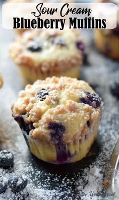 some blueberry muffins are sitting on a table