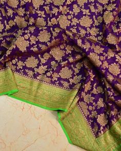 Item...Khaddi georgette banarasi Saree Fabric...Pure Georgette with antique jari weaving Colour...Purple with parrot green contrast dye Length...Saree 5.5 MTR Bp...1 MTR Care...Dry wash Purple Dola Silk Pre-draped Saree With Self Design, Purple Georgette Blouse Piece With Self Design, Traditional Purple Meenakari Saree, Bollywood Style Purple Meenakari Saree, Purple Bollywood Saree With Meenakari, Purple Jamawar Saree With Zari Work, Purple Katan Silk Saree With Dupatta, Purple Georgette Saree With Pallu, Purple Dola Silk Dupatta With Meenakari