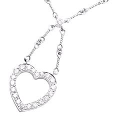 About This Piece:  Metal: Platinum  Measurements:  Chain Length: 16.5"  Drop: 1 1/4"  Weight: 11.3 grams  Pendant:  Stones: 17mm x 16mm Round brilliant cut diamonds VS1 clarity, G color total weight approx. .67ct  Hallmarks: Tiffany & Co PT950    Please refer to the dimensions in the description above for accurate measurements. Please reach out to the seller with any questions on dimensions or fit prior to purchase. Elegant Round Diamond Necklace With Heart Charm, Elegant Diamond White Necklace With Heart Charm, Formal Diamond White Necklace With Heart Charm, White Heart Charm Necklace For Formal Occasions, Elegant White Diamond Necklace With Heart Charm, White Gold Diamond Necklace With Heart Charm, Luxury White Gold Necklace For Valentine's Day, Luxury Double Heart Necklace With Diamond Accents, Formal Sterling Silver Diamond Necklace With Heart Charm