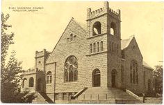 an old black and white photo of a church with stairs leading up to the front