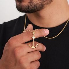 Elevate your nautical style with our 14K solid gold anchor pendant necklace for men. This boating-themed men's necklace is the perfect sailor gift, featuring a large anchor charm that's ideal for boat lovers. Crafted with attention to detail, it's a symbol of adventure and maritime passion. Discover the perfect accessory to express your love for the sea. -- ⋆ This product is designed with Runda's fine handcrafting with sustainable methods. ⋆ Express-insured shipping to the whole world and delivery to cargo in only 3 business days. ⋆ Free return and warranty Product Details * 14K Real Solid Gold * Black Enamel * Customizable Chain Size * Yellow - White - Rose Gold Available * Lobster Claw Clasp * Hypoallergenic * Model No X2P211693 -- ♻️ UPCYCLING THE FUTURE A more sustainable future is det Men's Necklaces, Gifts For Sailors, Anchor Pendant, Anchor Charm, Mens Necklace, Nautical Style, Nautical Fashion, Necklace For Men, Men's Necklace