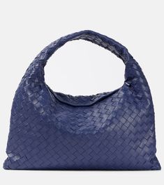 Find BOTTEGA VENETA Hop Small Leather Tote Bag on Editorialist. The Bottega Veneta Hop Small leather tote bag is crafted from calf leather with a calf leather lining. It features a top handle, a magnetic fastening and an internal zipped pocket. The bag is made in Italy. Blue Calf Leather Shoulder Bag For Evening, Designer Blue Shoulder Bag With Leather Lining, Blue Woven Leather Shoulder Bag, Blue Rectangular Bag With Intrecciato Weave, Blue Woven Leather Bags For Daily Use, Designer Blue Woven Leather Shoulder Bag, Blue Leather Shoulder Bag With Woven Detail, Chic Blue Bag With Woven Leather, Blue Bags With Intrecciato Weave