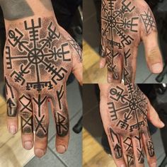 two hands with different designs on them, one is black and the other has white ink