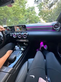 the interior of a car with dashboard and steering wheel