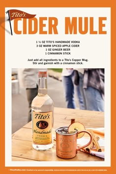 an advertisement for cider mulle on a wooden table