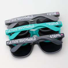 three pairs of sunglasses with the words let'sgettchwald printed on them