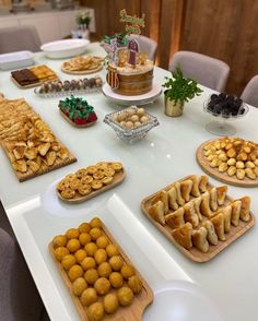 a table topped with lots of different types of food