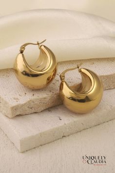 Fall in love with these Chunky Hoop Stainless Steel Earrings. The chunky look adds a fun flare to any look. Plus, no need to worry about getting them wet - they're waterproof! 1.25" Diameter 18K Gold Plated Stainless Steel Closing: Push Back Post Length: 0.8" Width: 0.5" It comes with a cleaning cloth and storage bag Care instructions: To preserve its shine and quality, keep your jewelry dry. Stainless Steel Texture, Gold Round Earrings, Water Drop Earrings, Chunky Hoop Earrings, Chunky Earrings, Steel Earrings, Earring Sale, Gold Drop Earrings, Stainless Steel Earrings