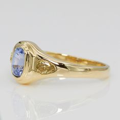 Neptune collection is finally here! Our version of signet ring with an oval light blue sapphire in the center, natural color diamond on each side, set in 18k yellow gold. Perfect for everyday wear, low profile and comfortable! Details: -One of a Kind -18k yellow gold -natural unheated oval blue sapphire approx. 0.70ct -natural color diamonds approx. 0.30ct -handmade in NYC Classic Oval Yellow Sapphire Ring, Blue Sapphire Diamond Ring, Light Blue Sapphire, Blue Sapphire Diamond, Sapphire Diamond Ring, Sapphire Diamond, Signet Ring, Natural Color, Low Profile