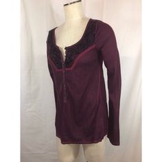 --Free People Thermal Blouse --New With Tags --Misses Size Large --Wine Colorway --Thermal Waffle Knit Fabric With Mesh And Fuzzy Yarn Embellished Yoke --Button Front Detail --Long Sleeve --Style F535u593 --Body: 65% Polyester, 35% Rayon; Mesh: 100% Polyester; Fuzzy Yarn: 100% Acrylic --Approx. Measurements: Bust: 35", Length: 26", Sleeve Length: 28" Fitted Red Tops With Lace Trim, Fitted Red Top With Lace Trim, Red V-neck Top With Lace Trim, Red Bohemian Tops With Lace Trim, Bohemian Red Tops With Lace Trim, Bohemian Fitted Winter Tops, Fitted Bohemian Tops For Winter, Red Bohemian Top For Winter, Fall Cotton Tops With Lace Trim