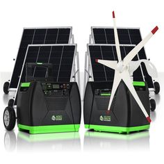 two green and black portable generators sitting next to each other with a wind turbine on top