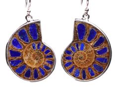 // Natural Sterling Silver Earrings with Genuine Lapis Lazuli Inlay // These earrings are one of a kind. You will receive the exact pair of earrings pictured! Each ammonite fossil measures 1" long by 3/4" wide. The ear wires/ drop length is approx. 3/4" long. These expertly crafted earrings have been made by taking pieces of Genuine Lapis Lazuli and creating an inlay inside of each cavity of the Ammonite fossil. Thanks for looking! Crafted Earrings, Fossil Jewelry, Ammonite Fossil, Sterling Silber, Ear Wires, Favorite Things Gift, Lapis Lazuli, Sterling Silver Earrings, Fossil