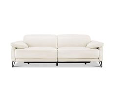 a white leather couch with black legs