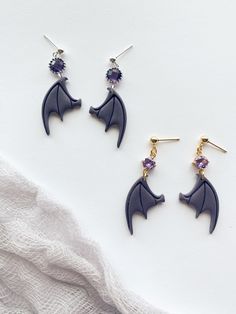 The Bat Boys! Earrings inspired by Rhysand from A Court of Thorns and Roses series by Sarah J Maas Acotar Earrings, Boys Earrings, The Bat Boys, Earring Inspo, Bat Boys, School Collection, Court Of Thorns And Roses, Sarah J Maas, Sarah J