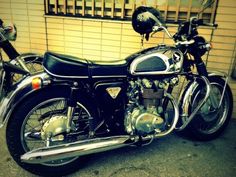 a motorcycle parked in front of a building