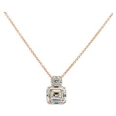 A simple yet elegant pendant necklace, showcasing a 7.81 carats emerald cut diamond certified by GIA as N color and VS2 clarity. Accented by a 1.45 carats radiant cut diamond. The two diamonds are set in a basket with 96 round cut pink diamonds weighing 0.32 carat total. Finely made with 18K rose gold and attached to a rose gold chain, 16 to 18 inches in length. Roman Malakov is a custom house, specializing in creating anything you can imagine. If you would like to receive a special quote on a c Luxury Elegant Rose Gold Custom Necklace, Luxury Gold Necklace With Diamond Accents, Luxury Timeless Necklace With Rectangular Pendant, Luxury Pendant Necklaces With Rose Cut Diamonds, Luxury Rose Cut Diamond Pendant Jewelry, Luxury Art Deco Necklace With Rose Cut Diamonds, Luxury Necklace With Rectangular Pendant, Luxury Brilliant Cut Rectangular Necklaces, Luxury Gold Radiant Cut Necklace