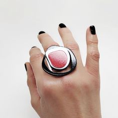 Make a statement with this unique bold cocktail ring!  The striking black, red, and white design is sure to turn heads and elevate your style game. With its modern and unique look, this ring is a must-have for any fashion-forward individual. Wear it confidently for any occasion, from casual outings to special events.  First designed in CAD 3D modeling software then made from PLA plastic (biodegradable thermoplastic derived from corn) by a 3D printer, the bold geometric design makes it ideal for Rings For Women Unique, Adventurous Women, Chunky Ring, Bold Rings, Chunky Rings, 3d Modeling, Contemporary Jewelry, Matching Necklaces, Rings For Women