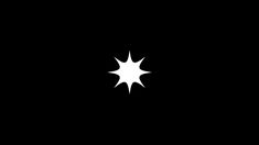 a black and white photo of a star in the dark