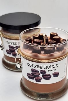 two jars filled with hot chocolate and coffee beans