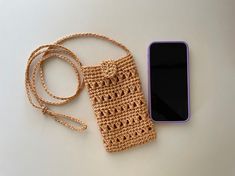 Create your very own stylish and practical phone crossbody purse for summer. It's a fun and practical accessory that you can use to store your essentials while keeping your hands free for activities.This pattern is suitable for both beginners and advanced-beginners in crocheting. You will create a beautiful and stylish raffia purse for your summer outings.IMPORTANT:❗ This is a Digital PDF Crochet Pattern ONLY❗ Finished items won’t be shipped to you. Thanks for your understanding!CUTE PATTERN AND Trendy Rectangular Phone Bag For Summer, Handmade Beige Rectangular Phone Bag, Handmade Casual Phone Bag For Beach, Summer Rectangular Phone Bag With Adjustable Strap, Casual Handmade Phone Bag For Beach, Rectangular Phone Bag For Daily Summer Use, Trendy Rectangular Phone Bag For Beach, Summer Beige Phone Bag With Adjustable Strap, Rectangular Phone Bag For Daily Use In Summer