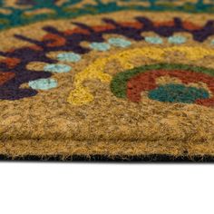 an area rug with various colors and designs on it