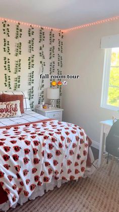 a bed room with a neatly made bed and lights on the wall next to it