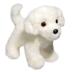 a white stuffed dog is flying through the air