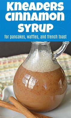 the cover of kneaders cinnamon syrup for pancakes, waffles, and french toast