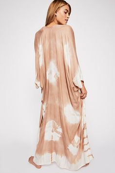 In a super soft fabric and tie dye pattern this oversized maxi kimono features statement cutout detailing under the arms. Flowy Long Cover-up For Vacation, Long Flowy Cover-up For Vacation, Flowy Unlined Cover-up For Vacation, Maxi Length Beachwear Cover-up For Brunch, Oversized Bohemian Cover-up For Loungewear, Bohemian Rayon Cover-up For Vacation, Bohemian Oversized Cover-up For Loungewear, Summer Bell Sleeve Kimono, Beige Flowy Bohemian Kimono