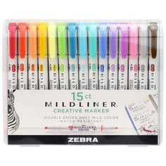 zebra multi - colored marker pens in display box with writing paper and pen tip markers