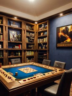 a game table in the middle of a room with bookshelves on either side