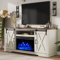 an entertainment center with a television and fireplace