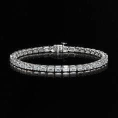 Ross-Simons - 10.00ct t. w. Emerald-Cut Lab Grown Diamond Tennis Bracelet. 7". Treat yourself to big, beautiful sparkle at an incredible value. Our exceptional 10.00 ct. t. w. emerald-cut lab-grown diamond tennis bracelet is a modern take on a classic style you crave. Finely crafted in polished 14kt white gold. Lab-grown diamonds are identical to mined diamonds according to their optical, physical and chemical properties. All Ross-Simons lab-grown diamond jewelry in 14kt gold and platinum includes an IGI Laboratory-Grown Diamond Report to verify color, clarity and carat weight. Single-latch safety. Push-button clasp, lab-grown diamond tennis bracelet. Diamond birthstones are the perfect gift for April birthdays. Luxury Emerald Cut Tennis Bracelet With Prong Setting, Luxury Emerald Cut Diamond Tennis Bracelet, Luxury Diamond Tennis Bracelet With Baguette Cut, Luxury Diamond Tennis Bracelet Baguette Cut, Luxury Silver Emerald Cut Diamond Bracelet, Luxury Diamond Bracelet With Asscher Cut, Formal Emerald Cut Diamond Bracelet With Single Cut Diamonds, Luxury Emerald Cut Tennis Bracelet For Anniversary, Platinum Diamond Bracelet With Brilliant And Baguette Cut