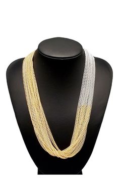 "Metallic Merger": Sections of glistening two tone chains collide with shimmery chains below the collar, linking into dramatic layers for an edgy effect. Features an adjustable clasp closure. Sold as one individual necklace. Includes one pair of matching earrings. Multi-strand Gold Necklaces With Silver Chain, Double Strand Chain Necklace For Party, Dramatic Layers, Necklace And Earrings, Gold And Silver, Matching Earrings, Gold Chains, Silver Chain, Two Tone