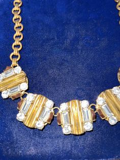 J Crew Chunky gold brass necklace with rhinestone diamonds. 16" long. Pristine condition. Gold Necklace With Bling For Formal Occasions, Formal Gold Necklace With Bling, Formal Gold Bling Necklace, Gold Costume Jewelry Necklace With Sparkling Stones, Costume Jewelry Rhinestone Necklace With Diamond Accents, Gold Crystal Necklace Costume Jewelry, Gold Rhinestone Costume Jewelry Necklace, Gold Crystal Costume Jewelry Necklace, Vintage Yellow Gold Necklaces With Rectangular Links