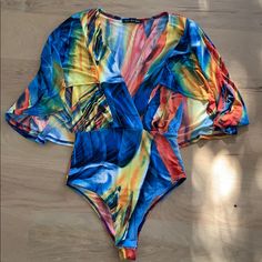 Colorful Bodysuit With Longer Sleeve Never Worn, Couldn’t Return Because I Removed Tags Colorful Bodysuit, Festival Outfits Rave, Outfits Rave, One By One, Festival Outfits, Blue Purple, Blue And Purple, Color Blue, Womens Tops