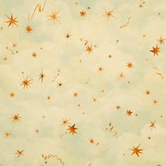 the sky is filled with gold stars on a pale blue and light green background for wallpaper