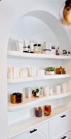 the shelves have many different types of items on them, including soaps and lotions