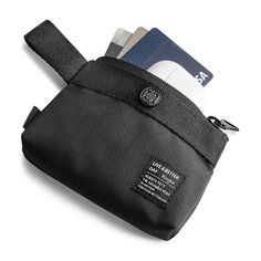 a black bag with some credit cards in it