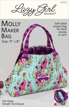 an image of a bag that is in the shape of a handbag with flowers on it