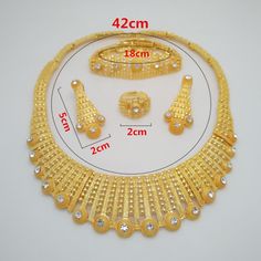 Dubai Gold Color Jewelry Sets For Women Big Necklace African Jewelry Set Women Italian Bridal Jewelry Sets Wedding AccessoriesModel Number:33029996241 Material: Austrian Crystal, Gold Filled Necklace length: about 42cm Bracelet length: about 18cm The ring diameter: Adjustable Quantity: 1 Set (Neckace+Bracelet+Earrings+Ring ) Condition: 100% Brand New Elegant Alloy Bridal Necklace For Wedding, Wedding Round Alloy Necklace, White Alloy Necklace For Wedding, White Necklace For Wedding, Alloy Costume Jewelry Necklaces For Wedding, Gold Metal Jewelry For Marriage, Gold Metal Jewelry For Wedding, Alloy Rhinestone Necklace For Wedding, Silver Plated Necklaces For Wedding